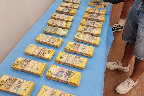 Cash totalling $200,000 was seized in the raid on the Leichhardt studio.