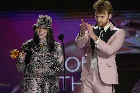 Billie Eilish, left, and Finneas accept the award for record of the year for Everything I Wanted.