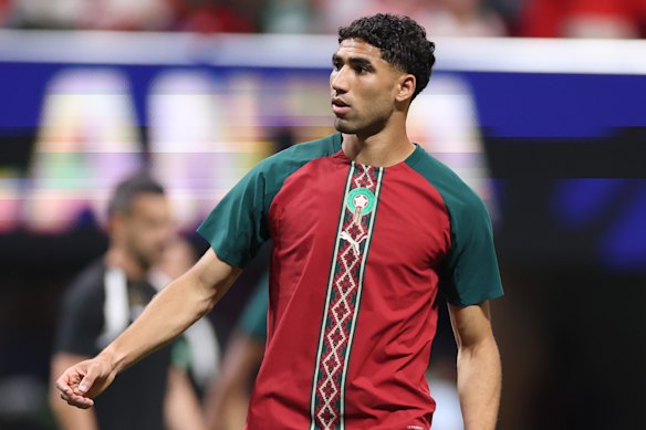 Achraf Hakimi warms up before the match against Haiti.