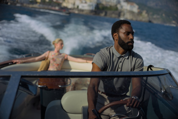 Elizabeth Debicki and John David Washington in a scene from Tenet.