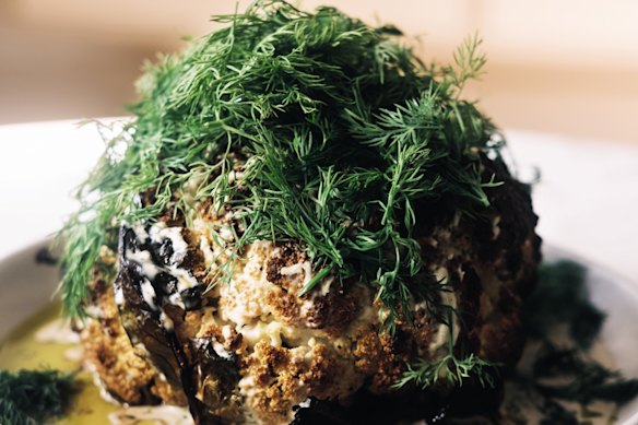 Dill oil and a mountain of dill fronds add wow factor to this whole roasted cauliflower.