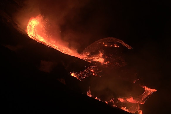 This photo, released by the US Geological Survey, shows lava flowing in the crater of the Kilauea volcano on Sunday.