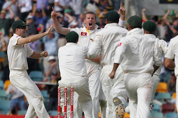 Siddle celebrates his famous hat-trick after dismissing England's Stuart Broad on the first day of the first Test at the Gabba on November 25, 2010.