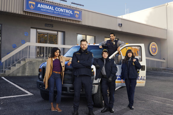 Joel McHale (second from left) with the Animal Control team.