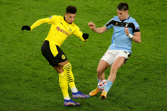 Dortmund's Jadon Sancho and Lazio's Patric in action in the 1-1 draw.