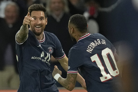 Lionel Messi and Neymar celebrate the former’s first goal in PSG colours.