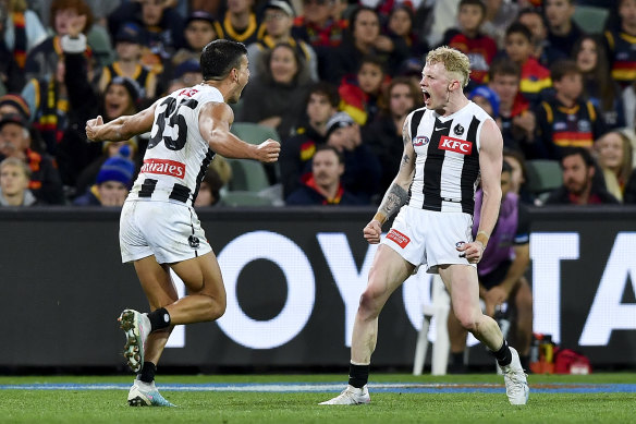 John Noble celebrates his late goal against Adelaide on Sunday.