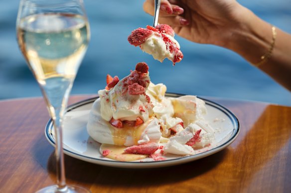 Strawberries and cream pavlova dessert.