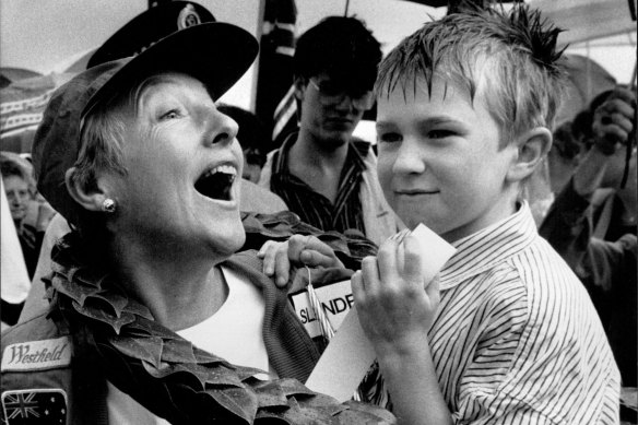 Gaby Kennard greeted by her son James (6) at Bankstown Airport.