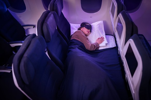 The Skycouch converts three economy seats into a bed.