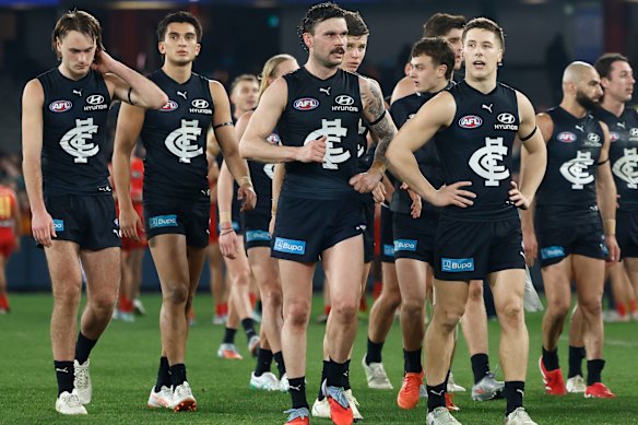 The Blues walk off Marvel Stadium.