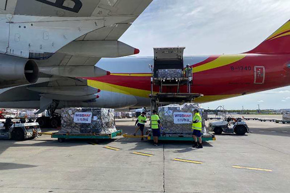 A cargo plane carrying more than 70 tonnes of personal protective equipment and ventilators arrives in Sydney on April 8.