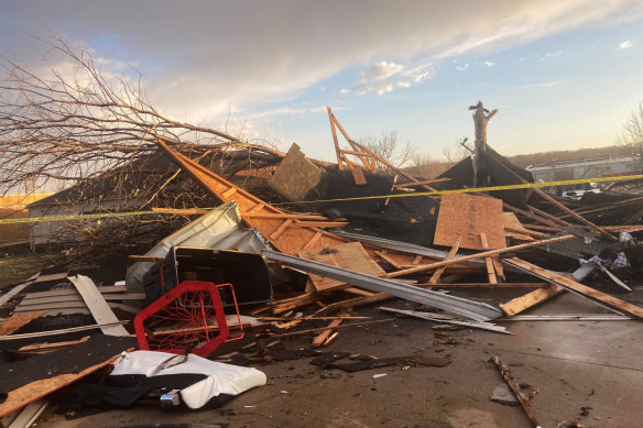 Homes are damaged after a tornado swept through Coralville, Iowa, on Friday.