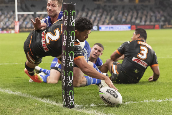 David Nofoaluma scores in the Tigers big win.