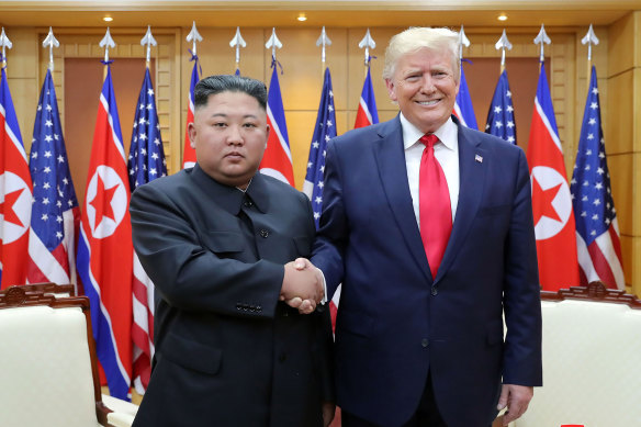 Kim Jong-un shakes hands with US President Donald Trump in June 2019. 