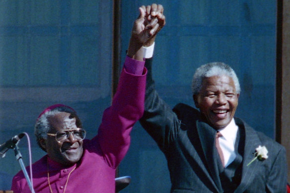 Desmond Tutu and former  South African president Nelson Mandela, right,  in Cape Town in 1994..
