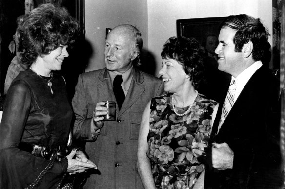 John Coburn and Barbara Coburn with Lady Harrison and Barry Stern at a cocktail party. Coburn’s painting, Study for Performance, was the prize in a competition during the evening.