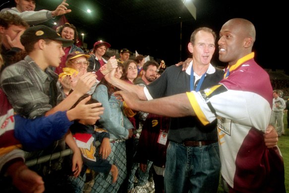 Wendell Sailor and Wayne Bennett celebrate after the 1997 grand final win.