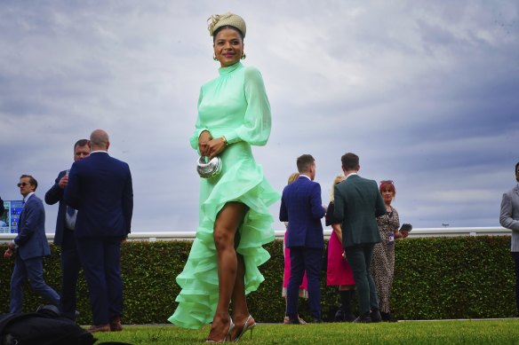 Victoria Latu in an Elliatt dress and a Gregory Ladner hat.