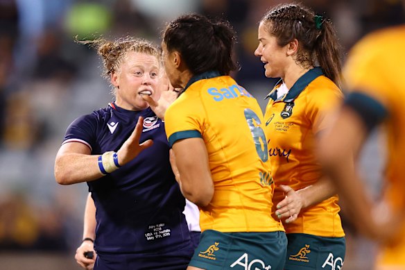 Alev Kelter is challenged by Wallaroos captain Siokapesi Palu after being involved in a stomping incident.