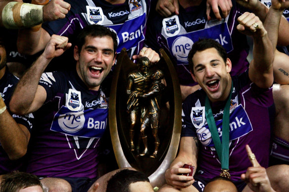 Cameron Smith and Billy Slater celebrate the 2009 grand final victory over Parramatta, which was later stripped from the club for salary cap breaches.