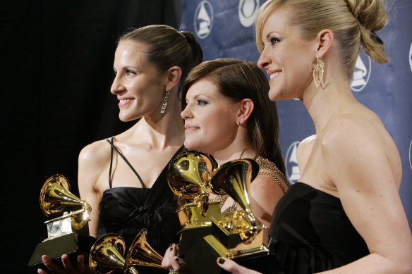 The Dixie Chicks (now called The Chicks) with their Grammy Awards in 2007, four years after being “cancelled” for criticising then-president George W. Bush.