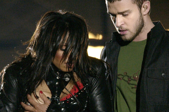 Janet Jackson, left, covers her breast after her outfit came undone during the half-time performance with Justin Timberlake at the 2004 Super Bowl in Texas.