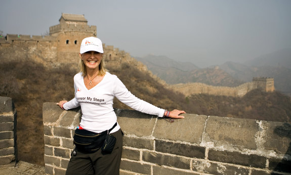 Olivia Newton John takes a pause on the Great Wall of China during a cancer research fundraising walk in 2008.