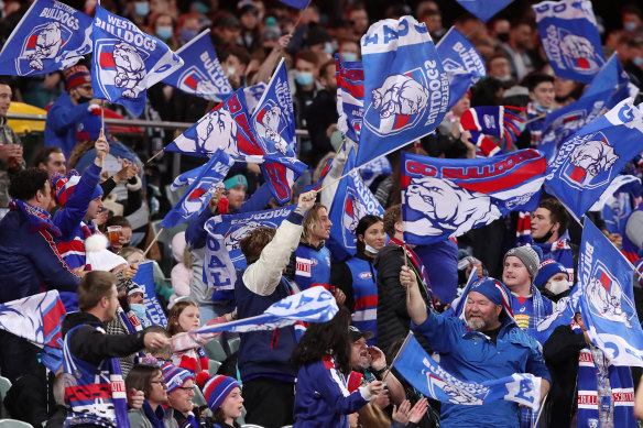 Bulldogs fans show their delight during the match.
