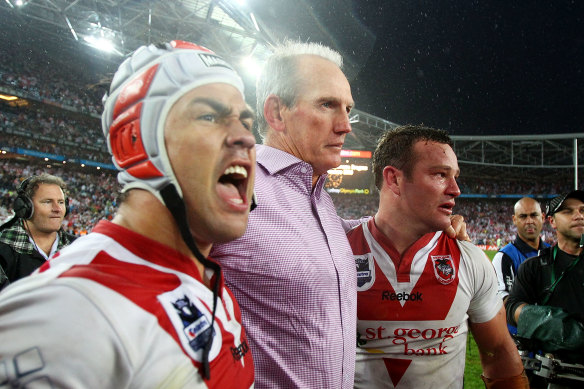 Jamie Soward, Wayne Bennett and Dean Young of the Dragons celebrate after their win in the 2010 Grand Final match against the Roosters