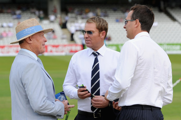 Geoffrey Boycott (left) speaks with Shane Warne and Michael Vaughan in 2014.