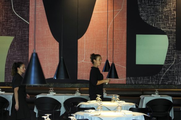 Saint George’s updated dining room, where the tables are covered in white linen.