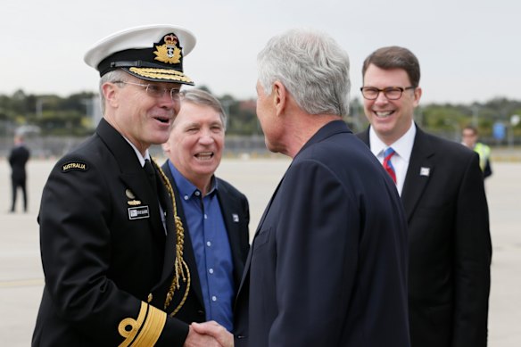 Richardson (second left) eschewed ties even when greeting then US secretary of defence Chuck Hagel in 2014.