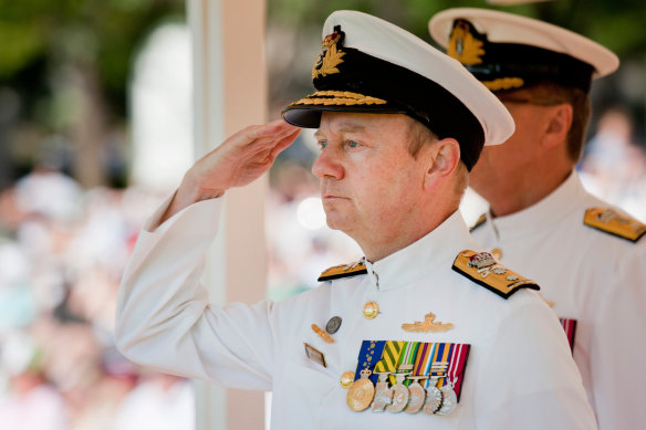 Rear Admiral James Goldrick returning a General Salute.