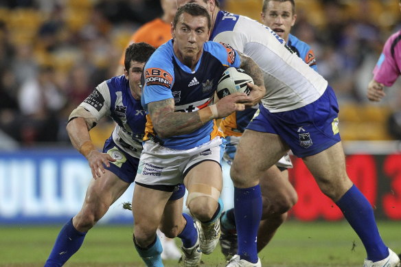 Mat Rogers playing for the Gold Coast Titans.