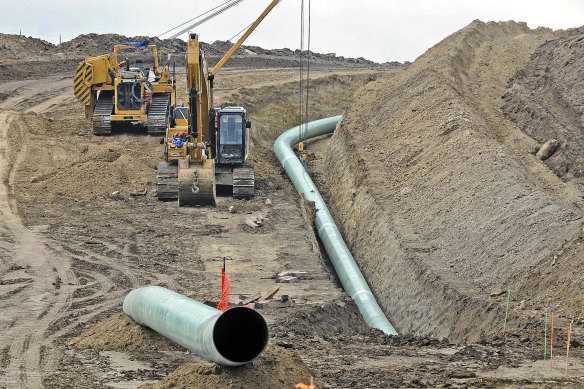 A section of the Dakota Access pipeline being buried near the town of St Anthony in Morton County, North Dakota, in 2016.