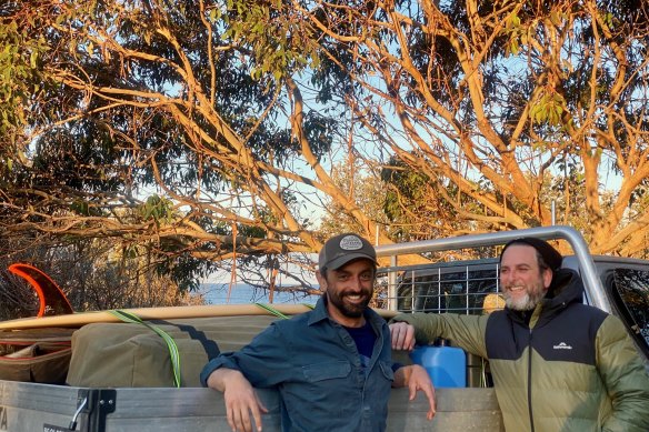 Defence barristers Adam Chernok (left) and Mark Gumbleton have swapped their robes for wetsuits and headed for the coast.