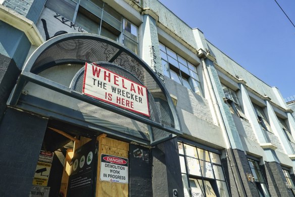 The new Whelan the Wrecker is knocking down a 1920s-era double-storey building at 9-13 Stewart Street in Richmond.