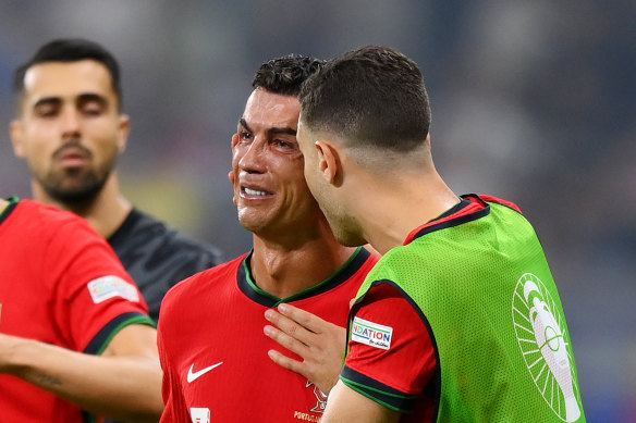 A distraught Cristiano Ronaldo after missing an extra-time penalty for Portugal.