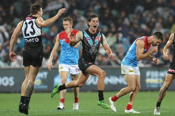 ADELAIDE, AUSTRALIA - MAY 19: Zak Butters of the Power celebrates a goal during the 2023 AFL Round 10 match between Yartapuulti/Port Adelaide Power and Narrm/Melbourne Demons at Adelaide Oval on May 19, 2023 in Adelaide, Australia. (Photo by Sarah Reed/AFL Photos via Getty Images)