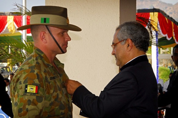 Dan Gosling receiving the Timorese Medal of Merit for service in supporting the development of the Timorese Defence Force from then president Jose Ramos Horta in 2009.