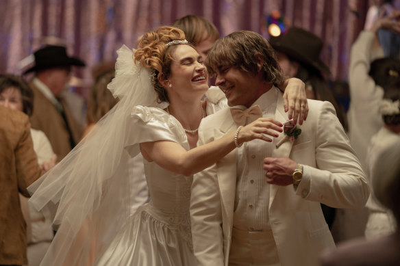Lily James as Pam Adkisson and Zac Efron as Kevin Von Erich in The Iron Claw.