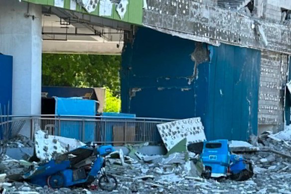 Vehicles damaged by debris after the earthquake in the Mindanao region, Philippines.