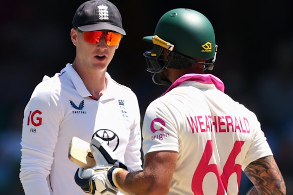 Harry Brook exchanges words with Australia’s Jake Weatherald at the SCG on Thursday.