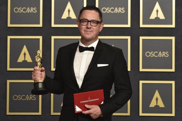 Greig Fraser in the press room with his Oscar for best cinematography for Dune.