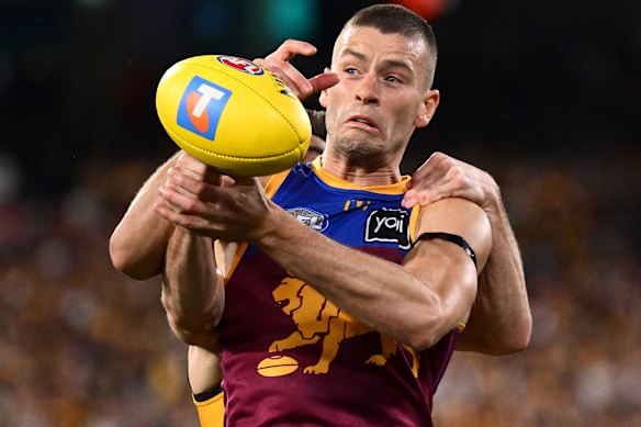 Josh Dunkley of the Lions marks.