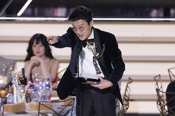 Hwang Dong-hyuk accepts the Emmy for outstanding directing for a drama series for Squid Game.