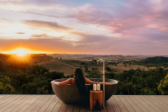 Bubble bath with sunset views.