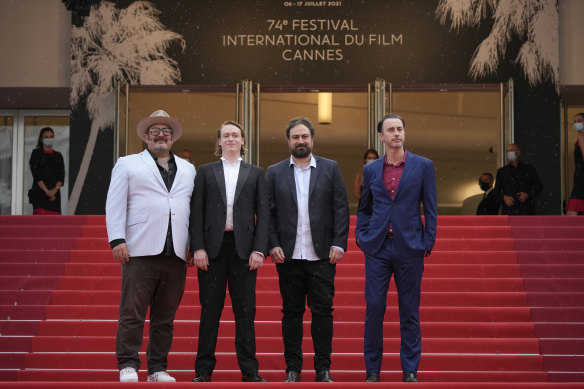 Nick Batzias, from left, Caleb Landry Jones, director Justin Kurzel and Shaun Grant pose for photographers upon arrival at the premiere of the film Nitram at Cannes.