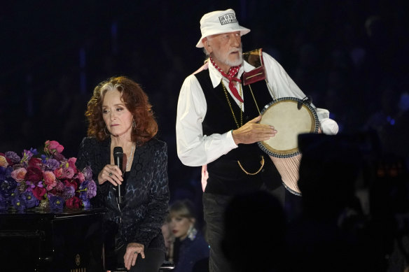 Bonnie Raitt, left, and Mick Fleetwood perform “Songbird” during a tribute to the late singer Christine McVie.